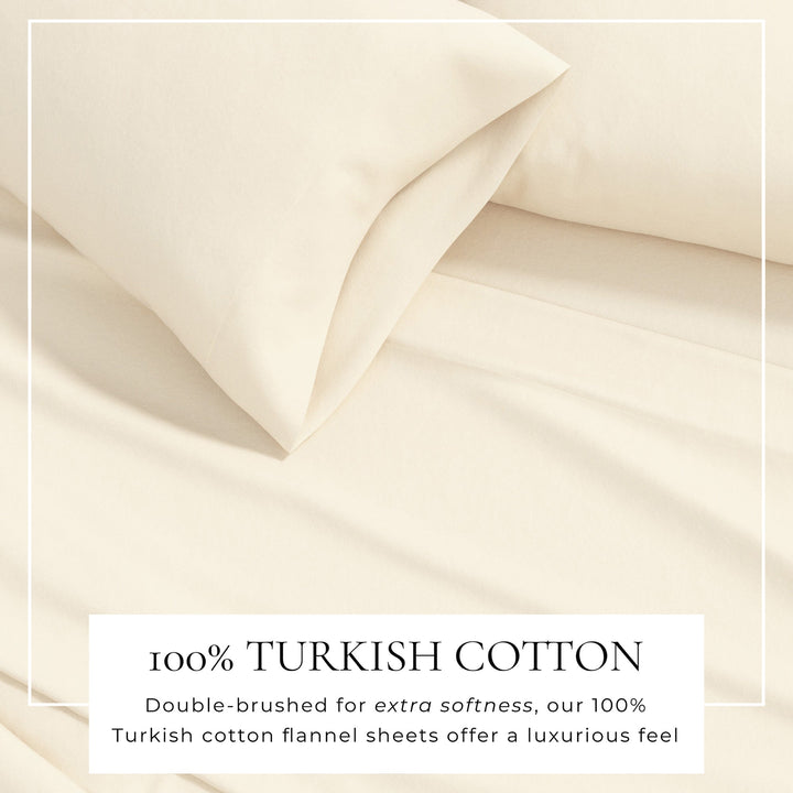 Pristine ivory cotton flannel sheet close-up with soft folded fabric