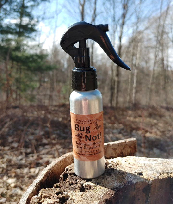 Bug Not plant-based insect repellent spray bottle with black sprayer, amber liquid