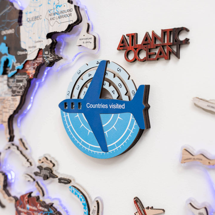 3D wooden world travel map with blue compass tracker and “Countries visited” label