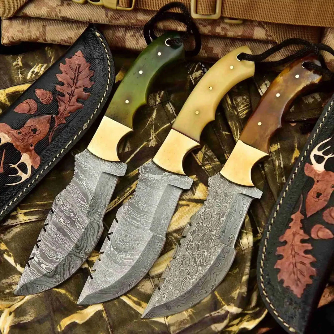 Damascus steel survival knives set with multiple colored handles and leather sheaths