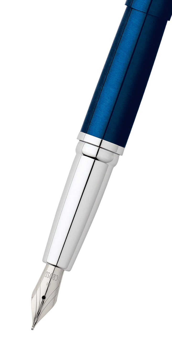Translucent blue lacquer fountain pen, stainless steel fine nib, silver grip