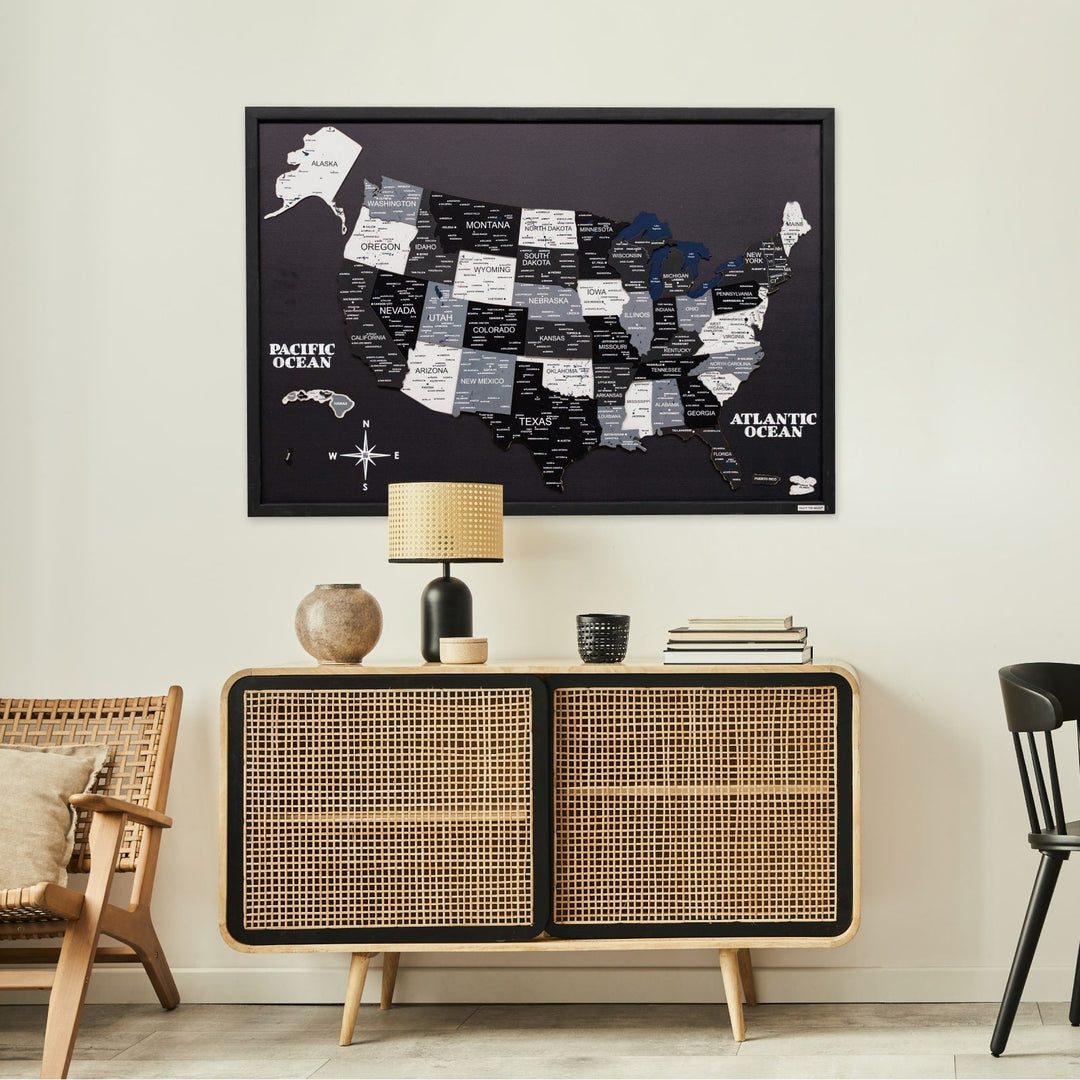 Framed wooden USA map wall board with black background and white state label shapes