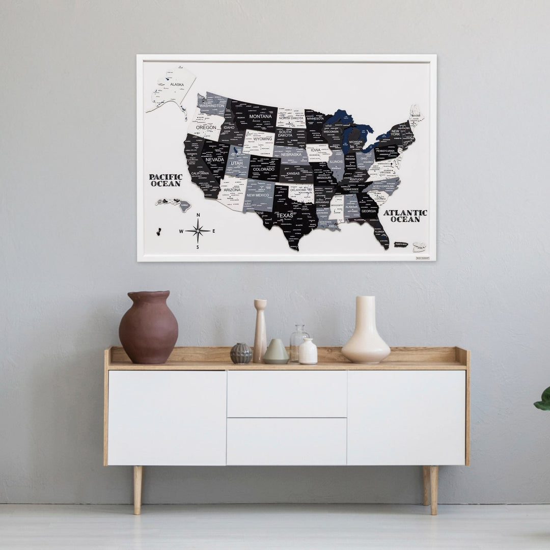 Wooden USA map wall board with framed white background and dark state text