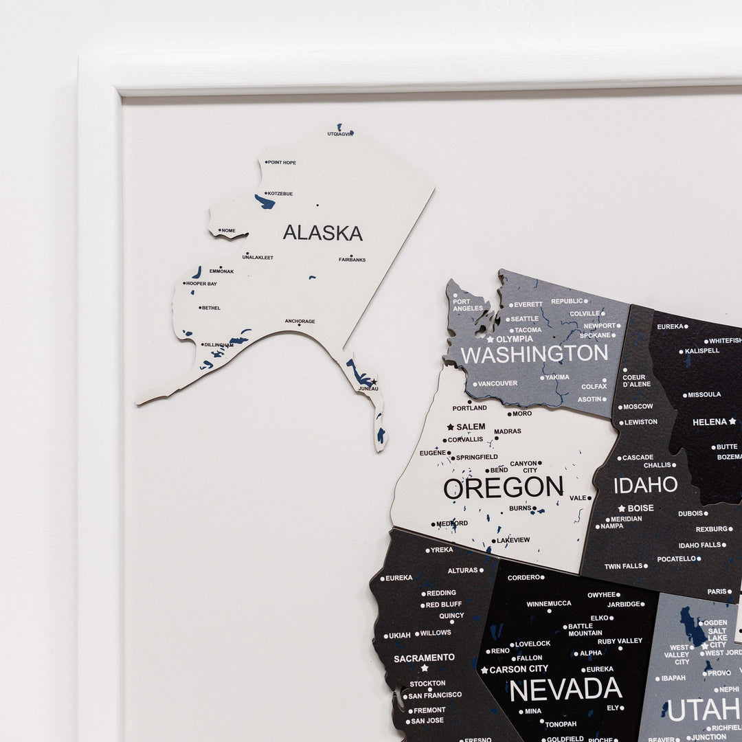 3D wooden USA map section with raised Alaska, Washington, Oregon, and state labels