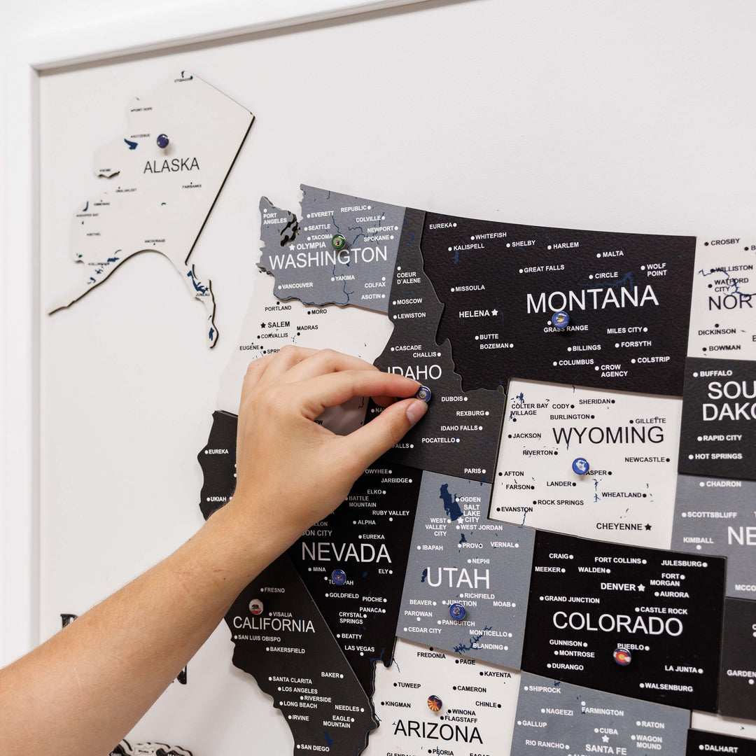 Close-up of 3D wooden USA map with raised Nevada, Idaho, Utah, and Colorado pieces