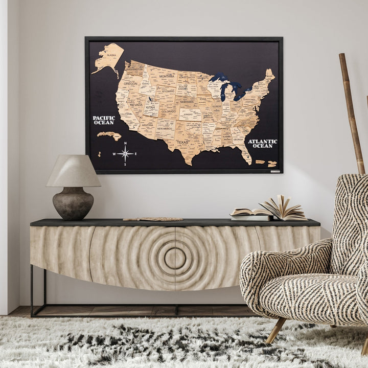 3D wooden USA map with white state outlines on dark board background and black frame