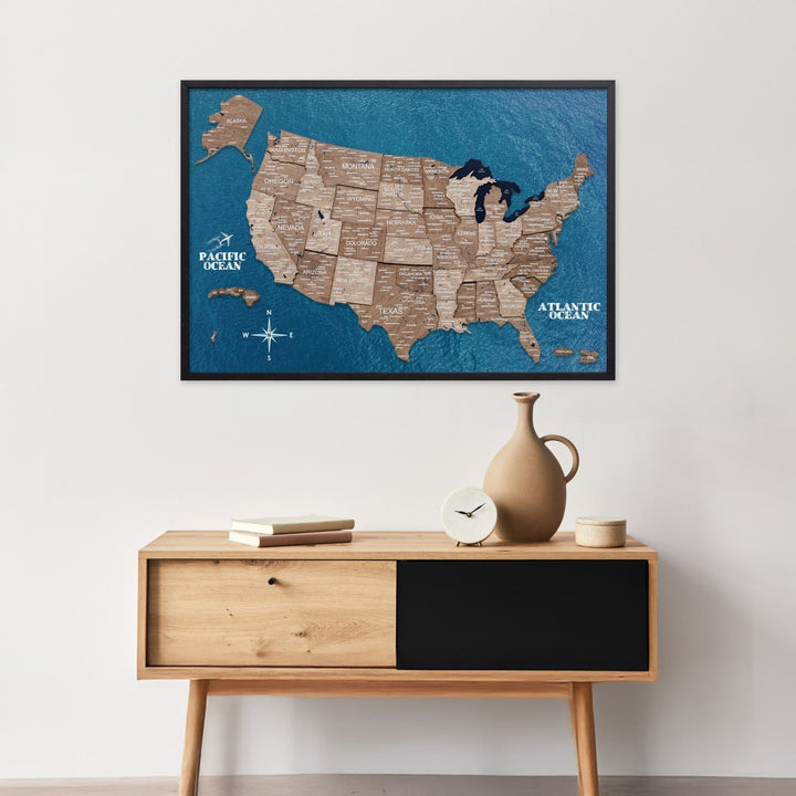 3D wooden USA map wall board on blue background with Pacific and Atlantic Ocean labels