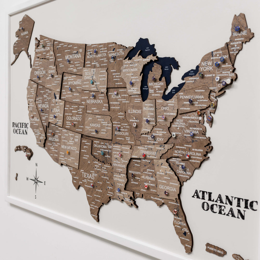 3D wooden USA map wall board close-up with state names and raised details
