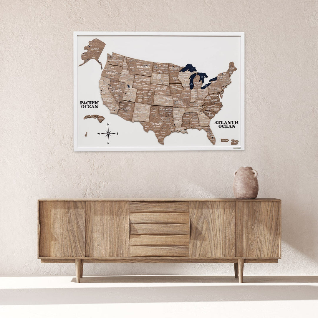 Framed 3D wooden USA map on white board with raised state pieces