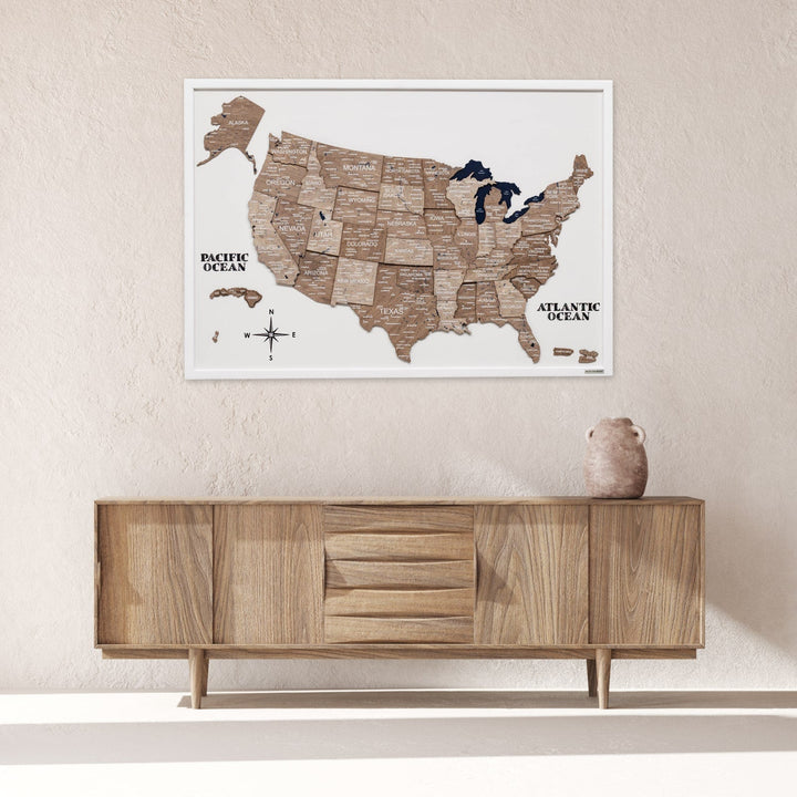 Framed 3D wooden USA map on white board with raised state pieces