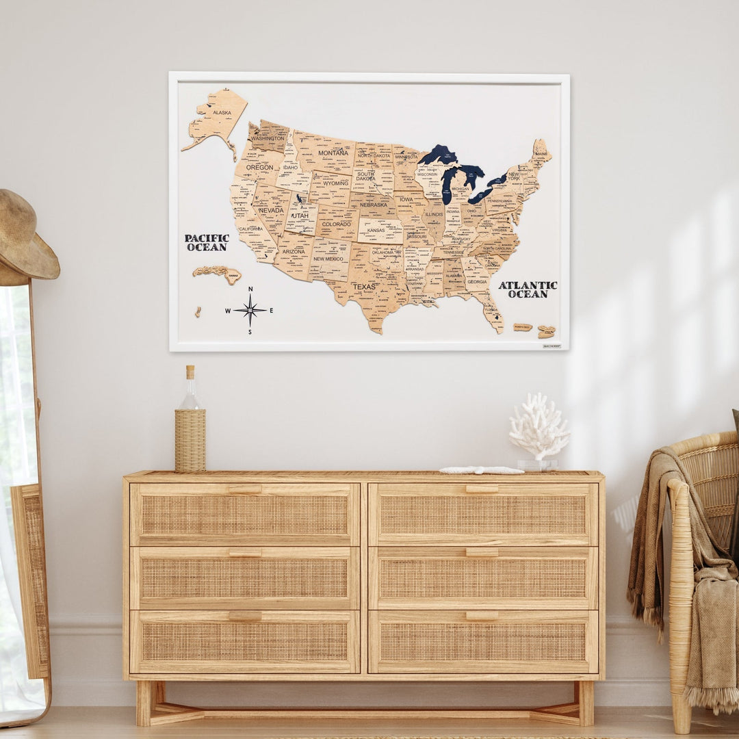 3D wooden USA map on white board with ocean labels and compass rose, wall-mounted