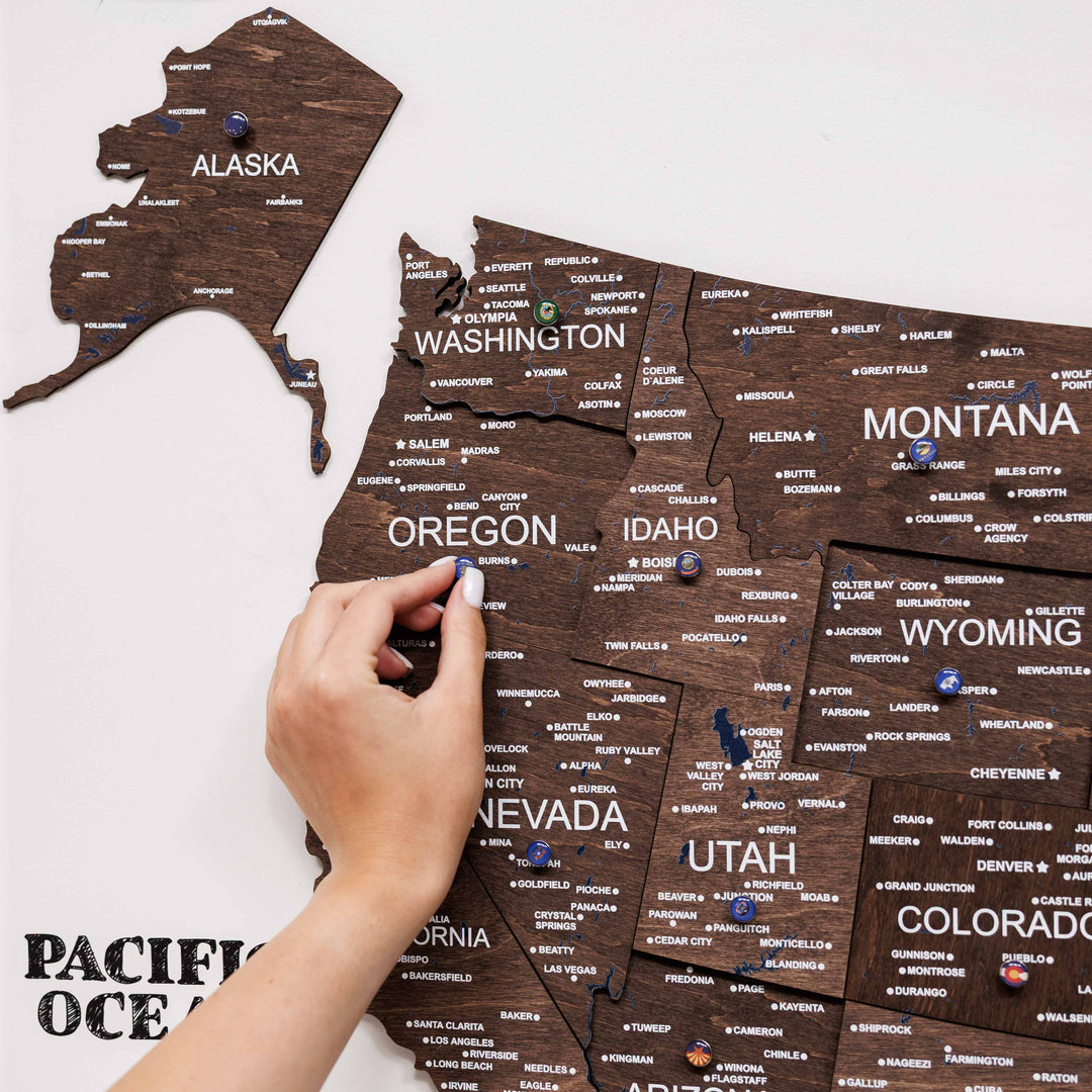 Close-up of dark walnut 3D USA map showing Alaska, Washington, Oregon, and Nevada