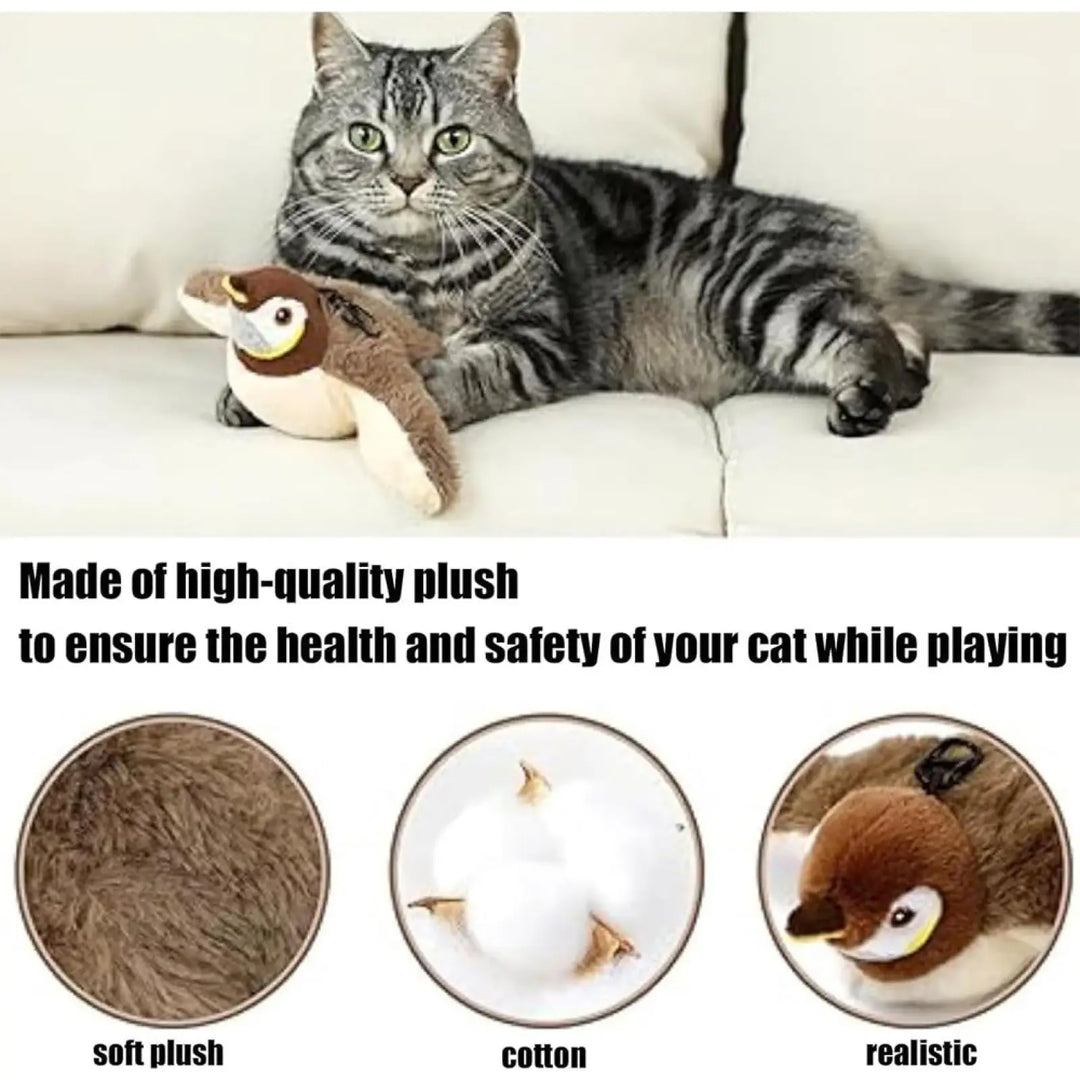 Tabby cat playing with a plush flying bird toy with realistic face