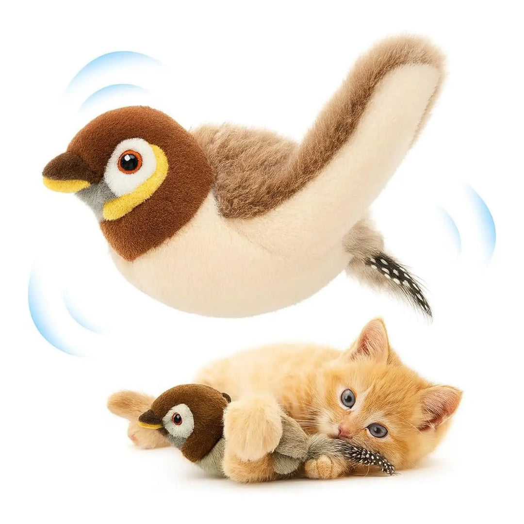 Plush flying bird cat toy with feathered tail, held near a kitten