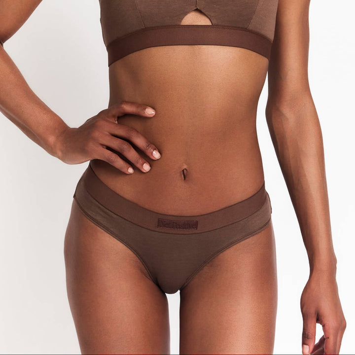 Dark brown mid-rise brief with smooth waistband and full-coverage back.