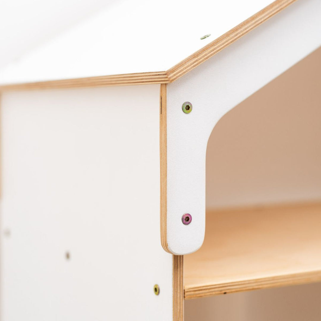 Wood dollhouse bookcase corner with rounded cutout and metal fasteners