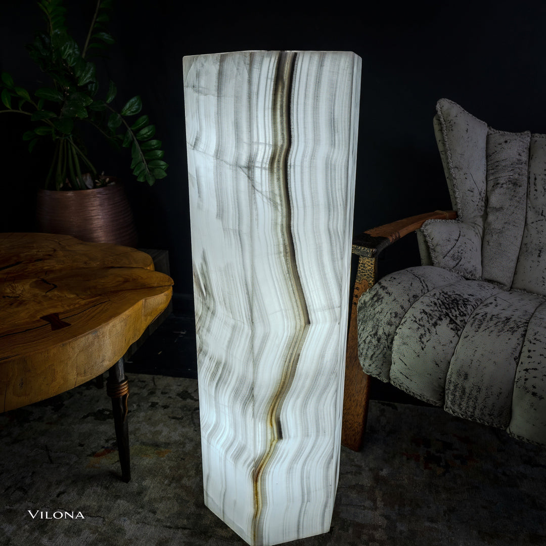 White onyx floor lamp full view, hexagonal column shade with vertical lines and tonal bands