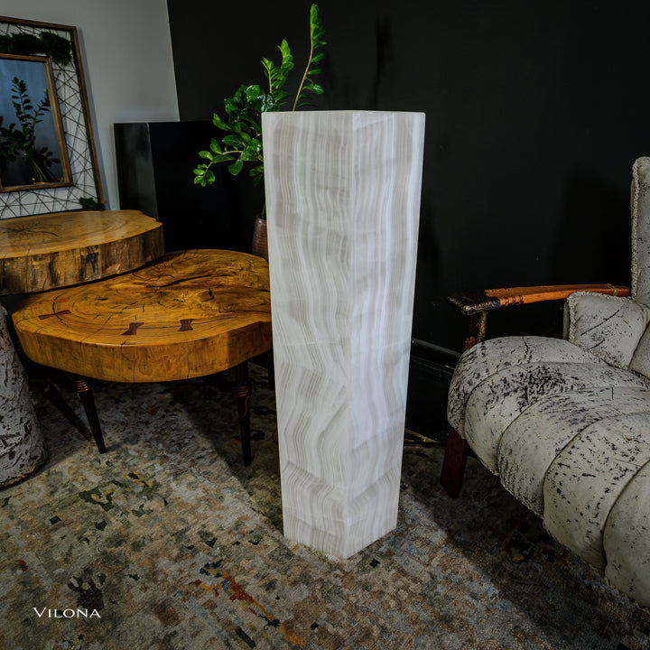 Small white onyx floor lamp, faceted hexagonal column with light veining
