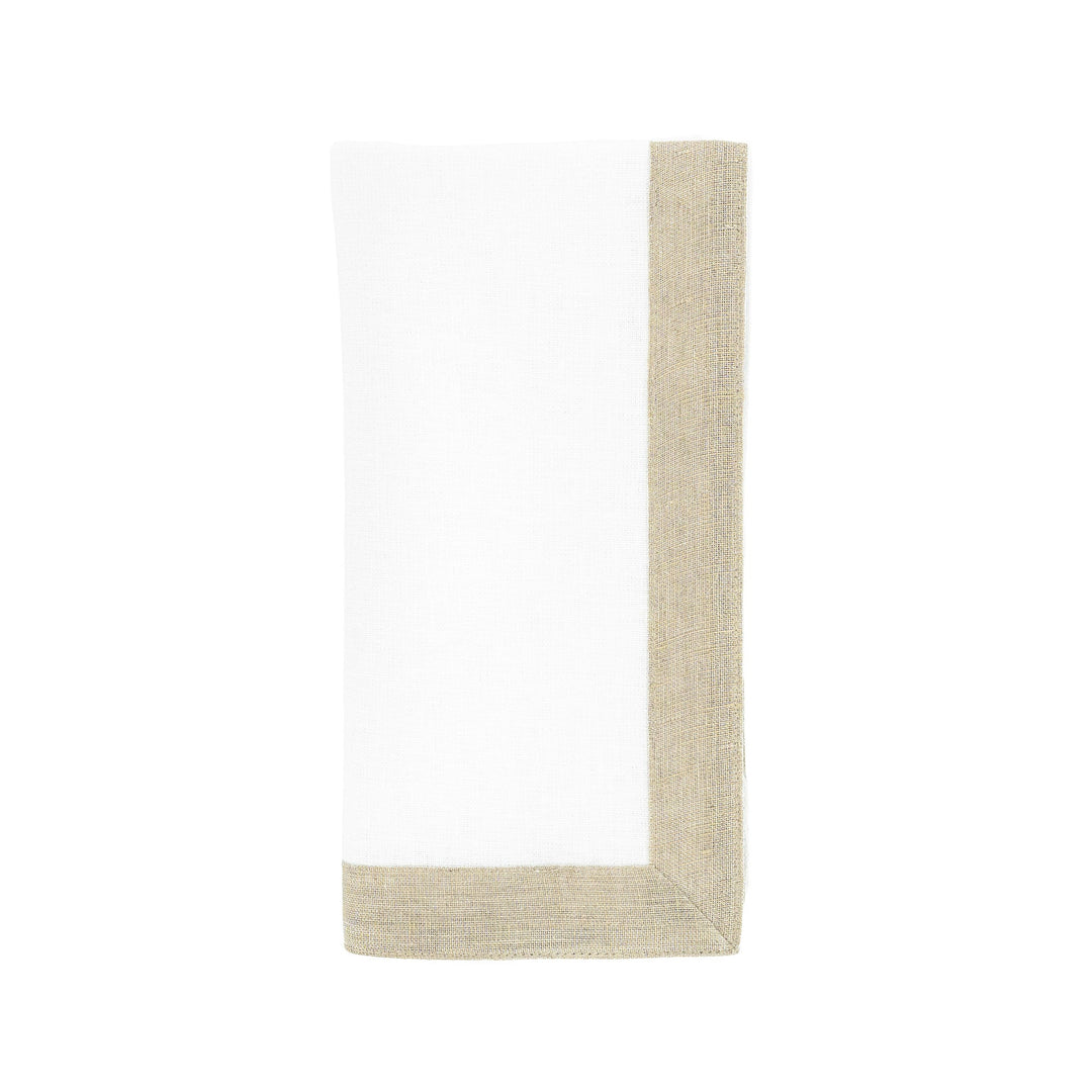 Linen napkin viewed from side: white fabric with tan sparkle border along one edge.