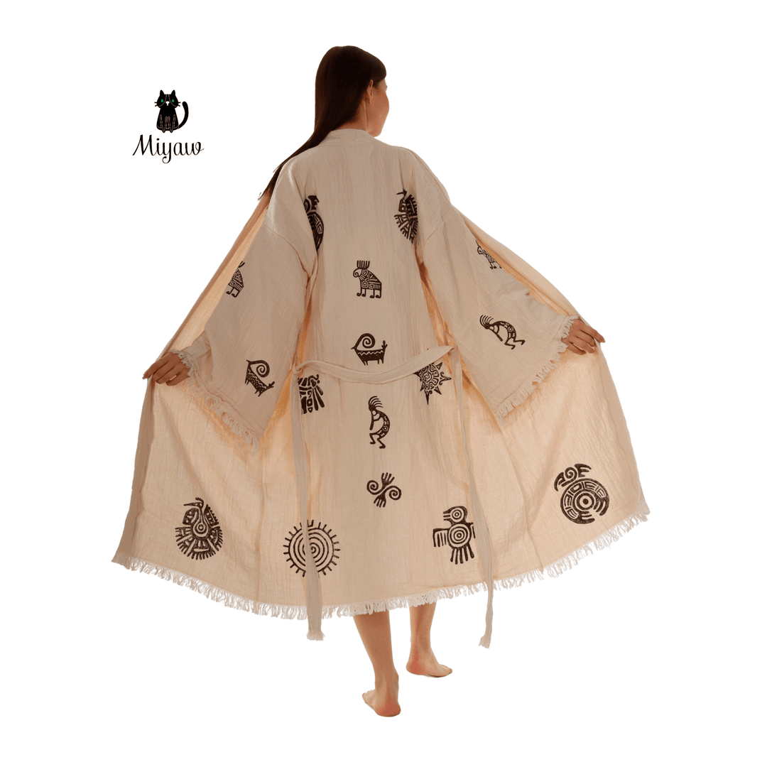Beige cotton kimono-style bathrobe with Aztec motifs and fringe hem, back view