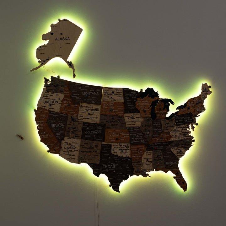 Wooden USA LED wall map with dark states and green glowing border outline.