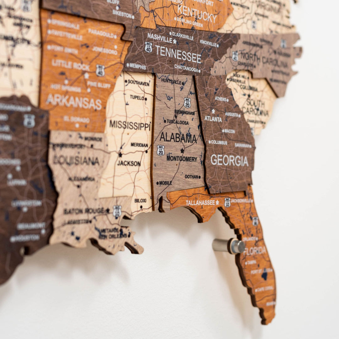 Detail view of wooden 3D LED USA map with multicolor state blocks and names