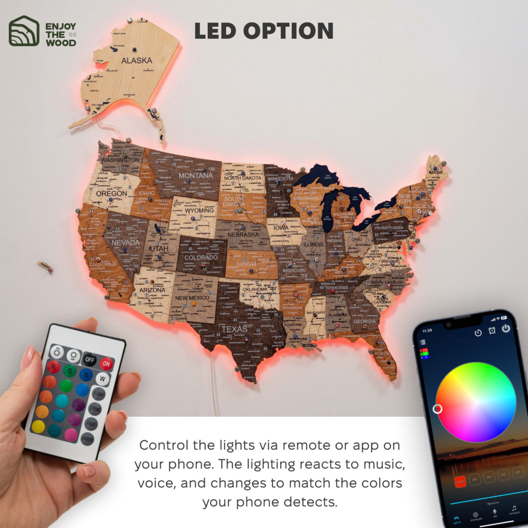 Wooden USA LED wall map with remote and smartphone for controlling multicolor lights.