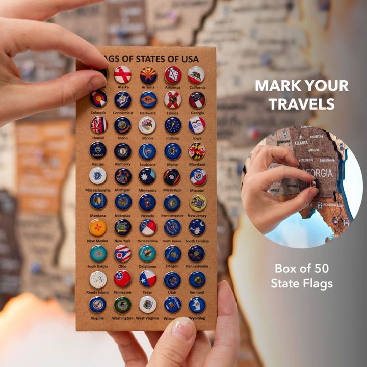 Wooden USA LED map with hands holding a sheet of round state flag stickers.