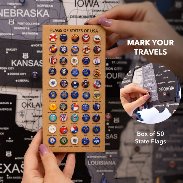 Wooden 3D LED USA map surface with state labels, hand placing state flag stickers