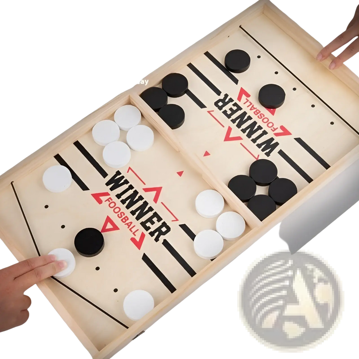 Desktop puck game board with black and white pucks on a wooden tray