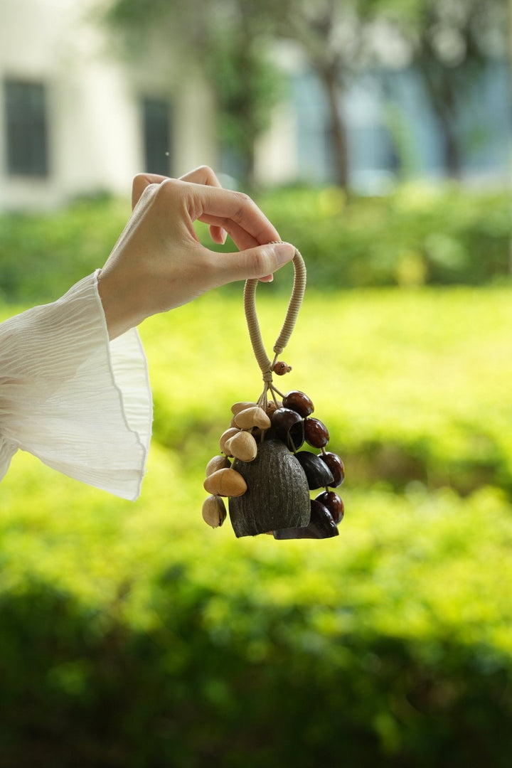 "The Forest Bell" - Mixed Natural Seed Cluster Charm with Beige Wrapped Handle