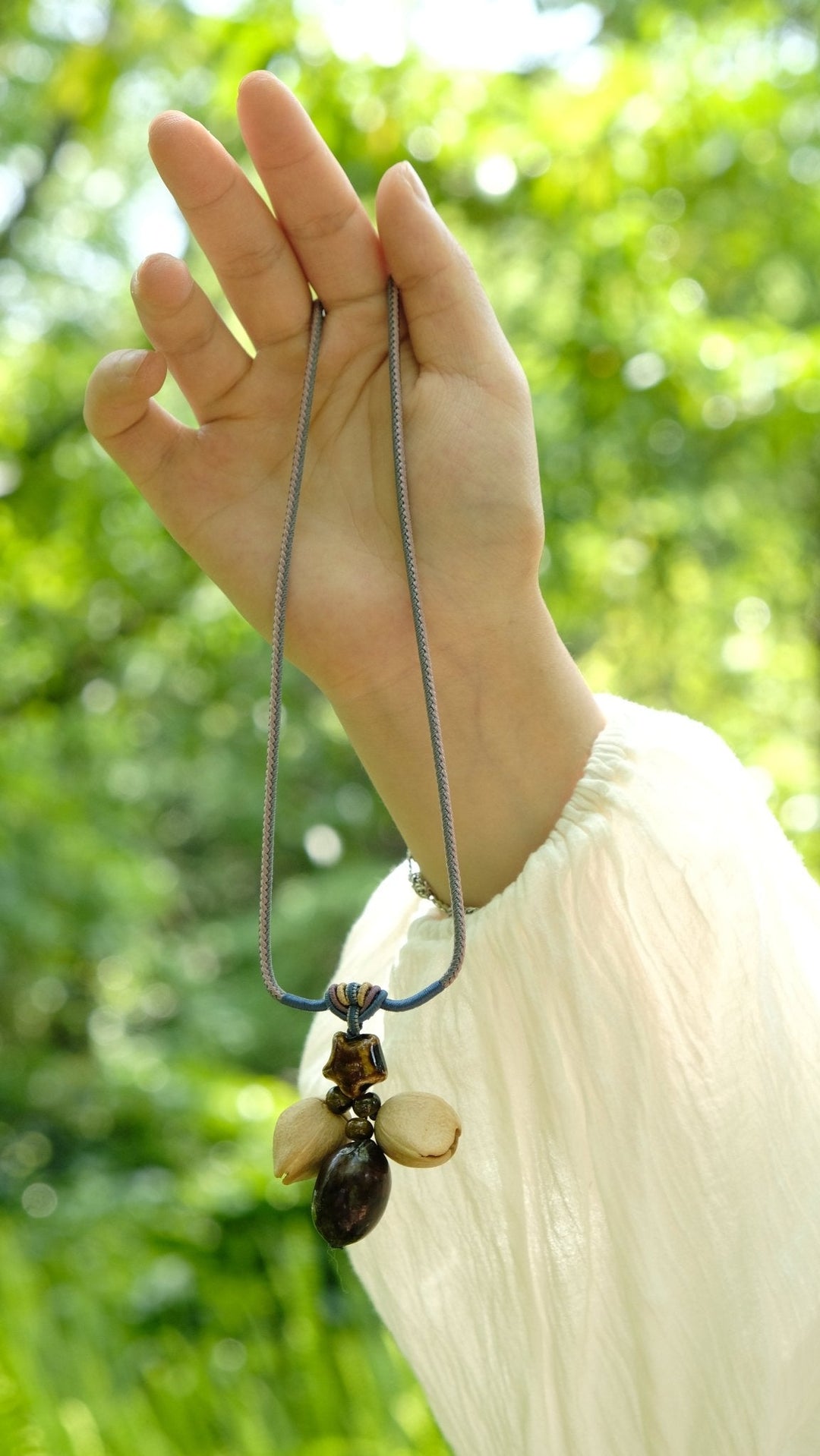 "Guiding Star" Natural Seed Glazed Necklace